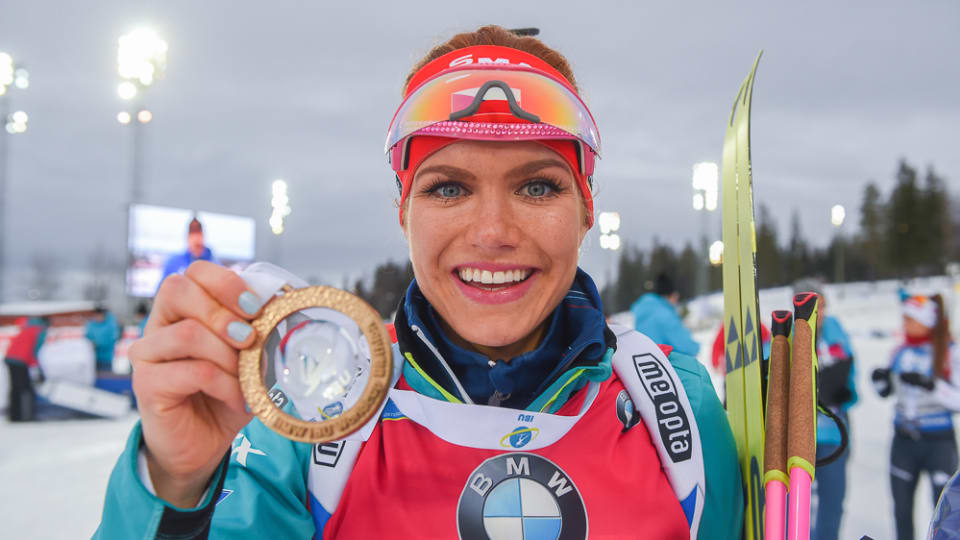 Gabriela Koukalová of the Czech Republic with her first-place prize after winning Sunday's 10 k pursuit at the IBU World Cup in Ostersund, Sweden. (Photo: IBU)