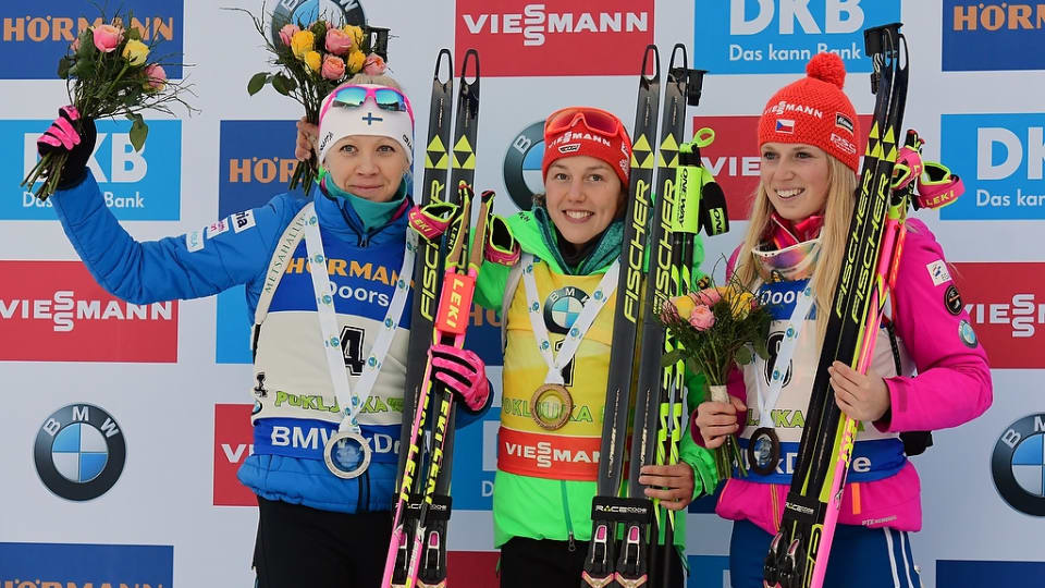 The women's 10 k pursuit podium at the IBU World Cup in Pokljuka, Slovenia, with German winner Laura Dahlmeier (c), Finnish runner-up Kaisa Mäkäräinen (l) and third-place finisher Eva Puskarčíková of the Czech Republic. (Photo: IBU)