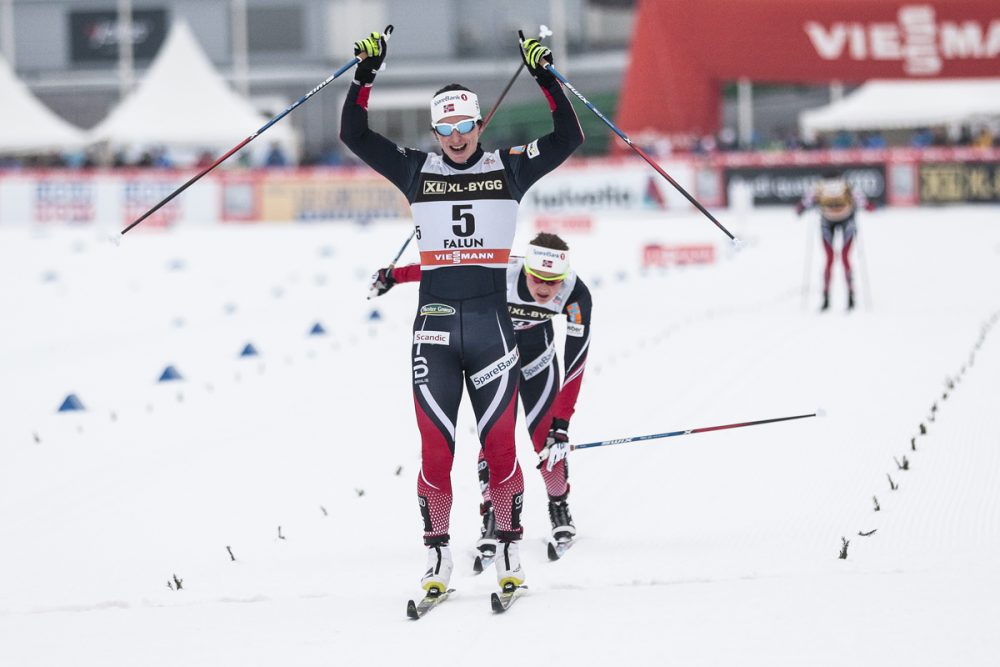 Norway's Marit Bjørgen celebrates her 105th individual World Cup win after she crosses first in the women's 15-kilometer classic mass start on Sunday in Falun, Sweden. (Photo: Fischer/NordicFocus)