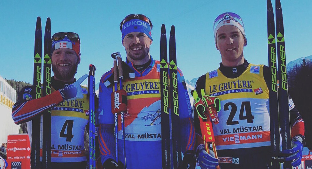 The men's 10 k classic mass start podium at Stage 2 of the 2017 Tour de Ski in Val Müstair, Switzerland, with Russia's Sergey Ustiugov (c) in first, Norway's Martin Johnsrud Sundby (l) in second, and Norway's Didrik Tønseth (r) in third. (Photo: FIS Cross Country/Twitter)