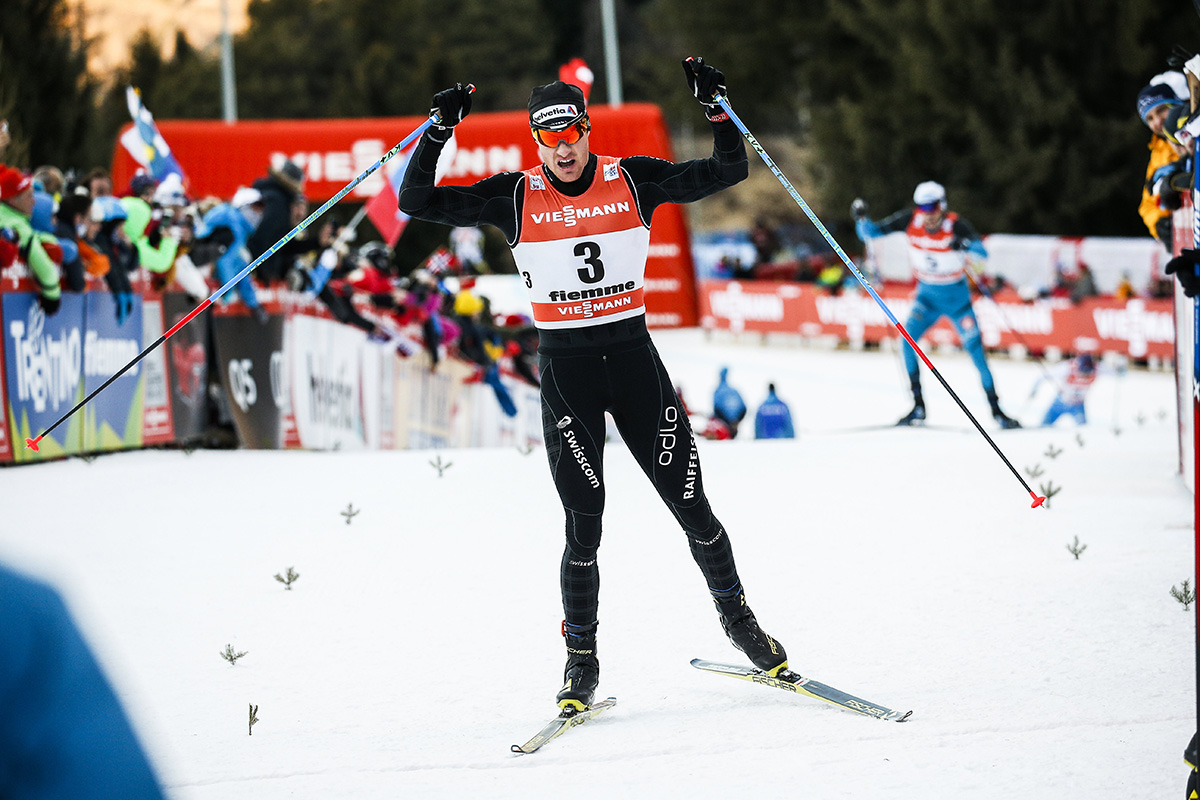 Switzerland's Dario Cologna celebrates third in at the top of the final climb in the last stage of the 2017 Tour de Ski on Sunday in Val di Fiemme, Italy. (Photo: Fischer/NordicFocus)