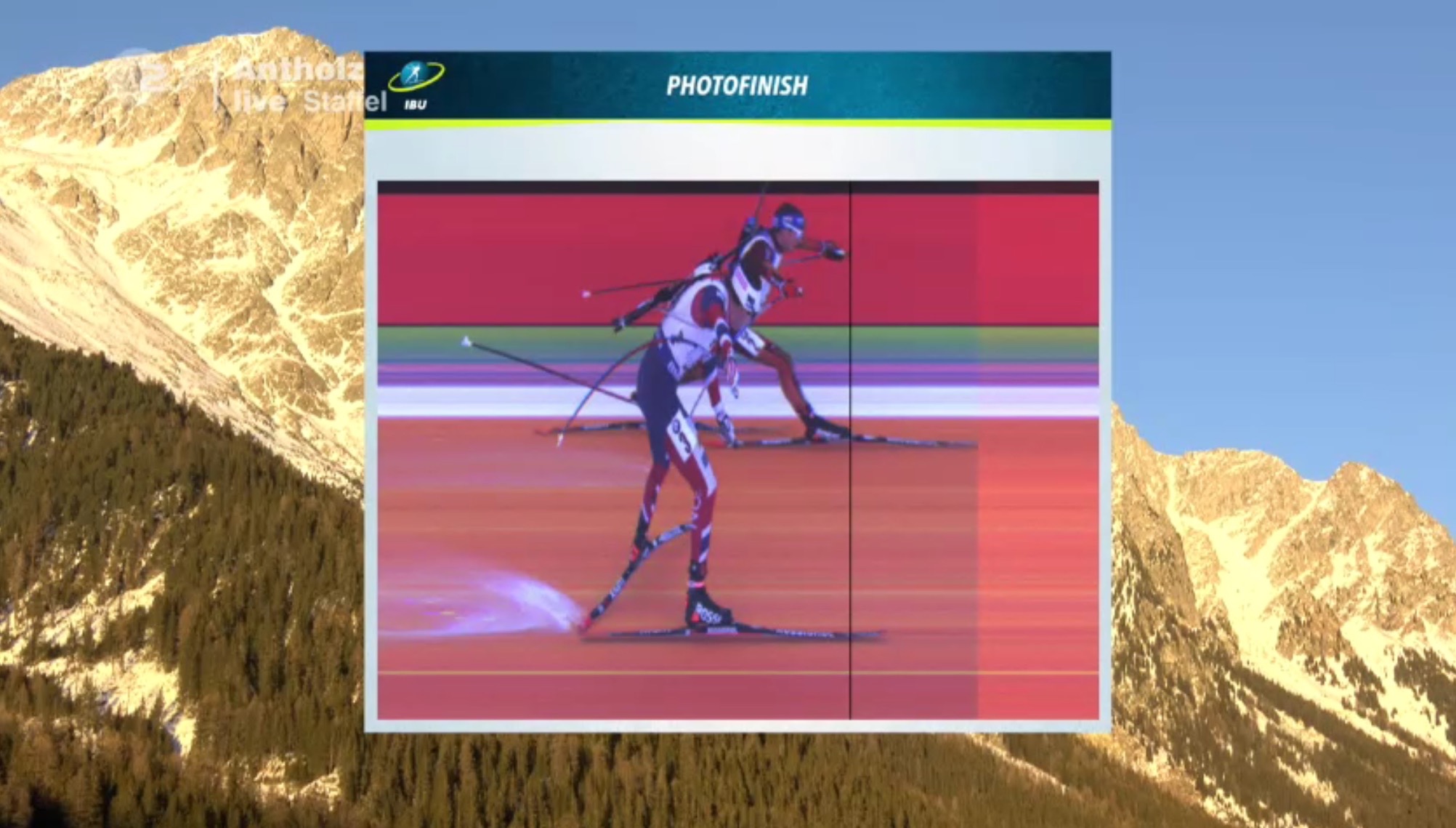 The photo finish of the men's 4 x 7.5 k relay on Saturday at the IBU World Cup in Antholz, Italy, with Germany's Simon Schempp outlunging Norway's Emil Hegle Svendsen. (Photo: IBU screenshot)