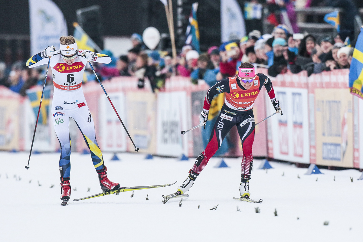 Sweden's Stina Nilsson (l) and Norway's Maiken Caspersen Falla (r) pushing for the win in the finishing stretch of the women's 1.4 k freestyle sprint final on Saturday in Falun, Sweden. Nilsson won by 0.01 seconds. (Photo: Fischer/NordicFocus)