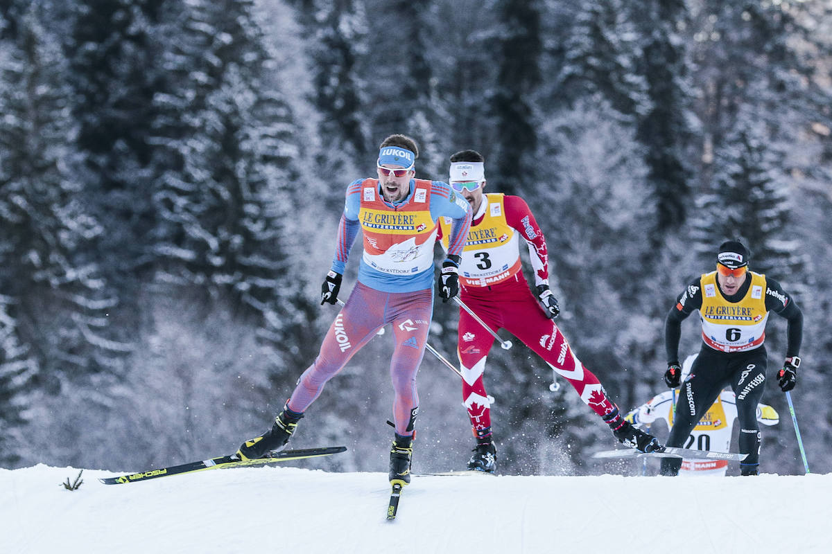 Tour de Ski leader Sergey Ustiugov of Russia leads Canada's Alex Harvey (3) on Tuesday in the Stage 3 skiathlon in Oberstdorf, Germany. Ustiugov won the 20 k race to maintain his overall lead in the Tour. Harvey placed fourth to hold onto third overall, and Switzerland's Dario Cologna (6) finished third on the day for fourth overall. (Photo: Fischer/NordicFocus)