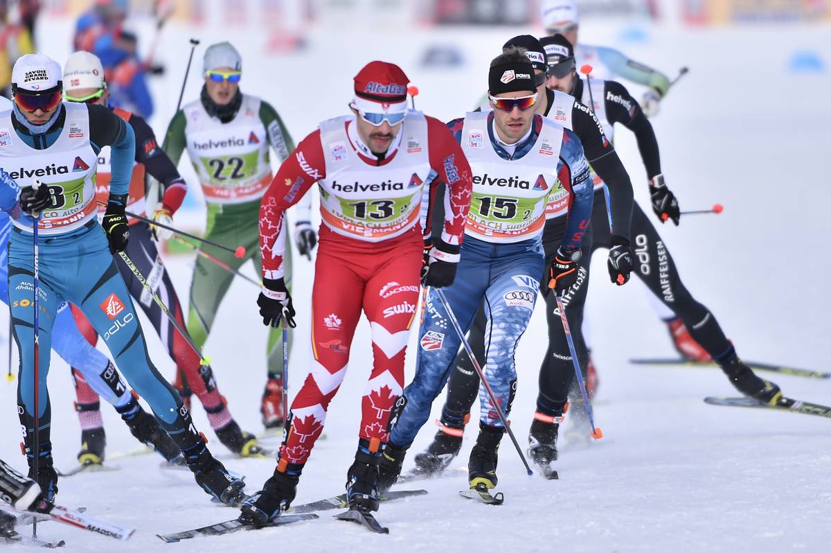 Canada's Alex Harvey (13) leading American Simi Hamilton (15) among others in the men's 6 x 1.3 k freestyle team sprint on Sunday at the World Cup in Toblach, Italy. (Photo: Salomon/Nordic Focus)
