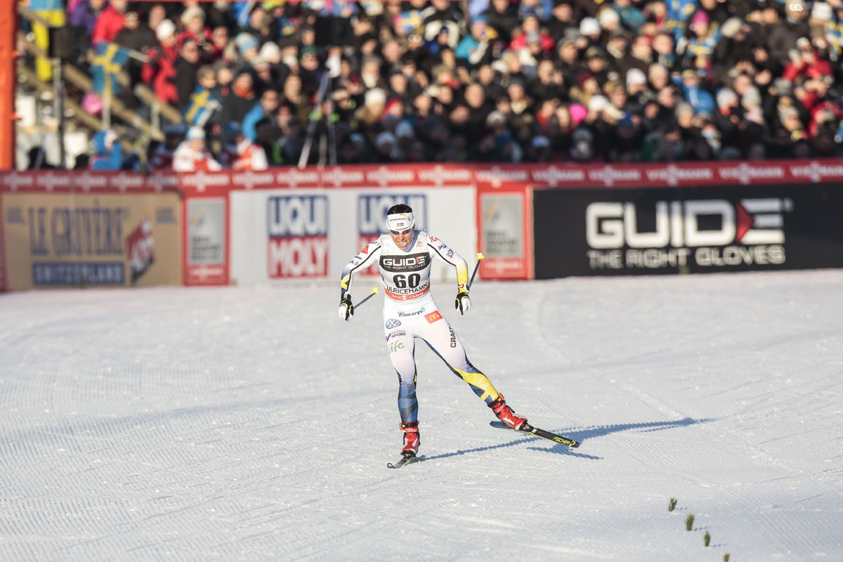 Charlotte Kalla racing to third place in the 10 k skate in front of a huge crowd in Ulricehamn, Sweden, on Saturday. (Photo: Fischer/Nordic Focus)