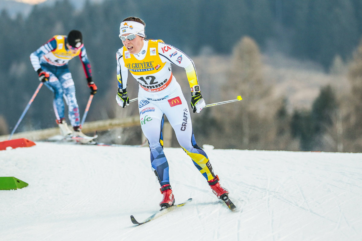 Charlott Kalla of Sweden racing to third place in the 10 k classic in Val di Fiemme, Italy. (Photo: Fischer/Nordic Focus)