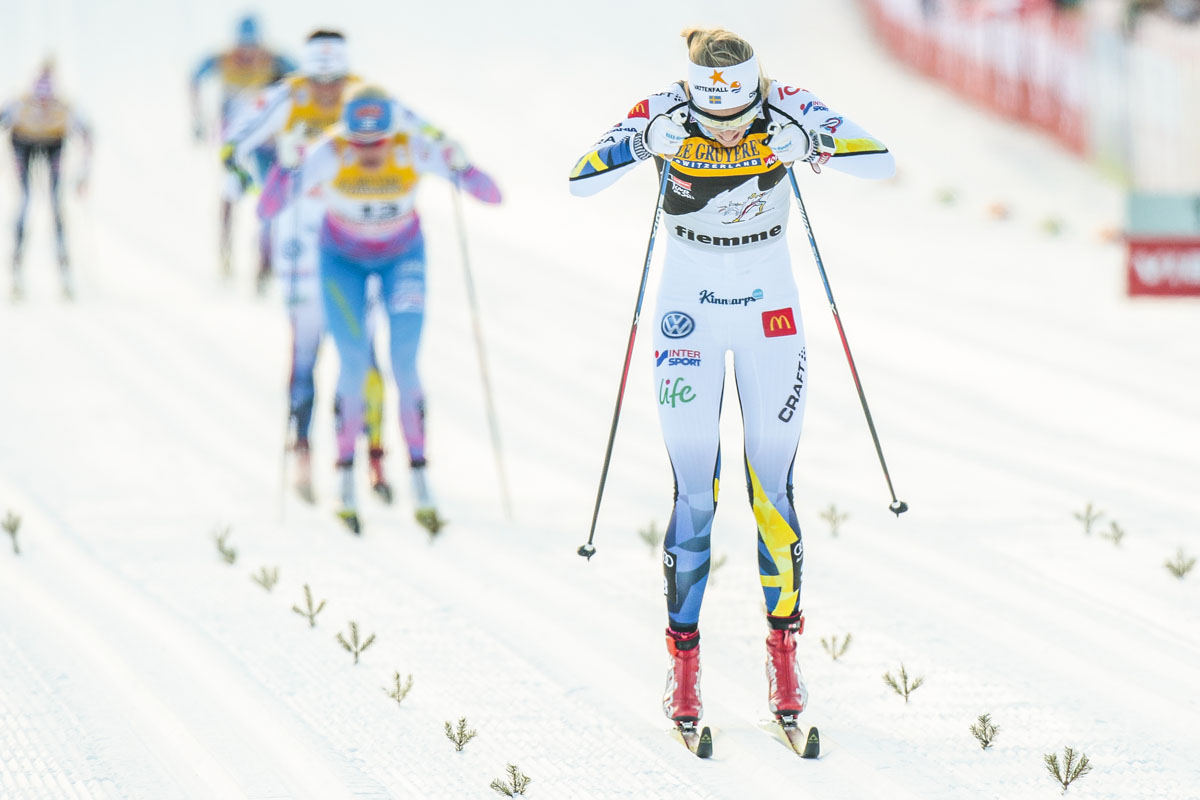 Stina Nilsson double-poling to the win in Val di Fiemme. (Photo: Fischer/Nordic Focus)