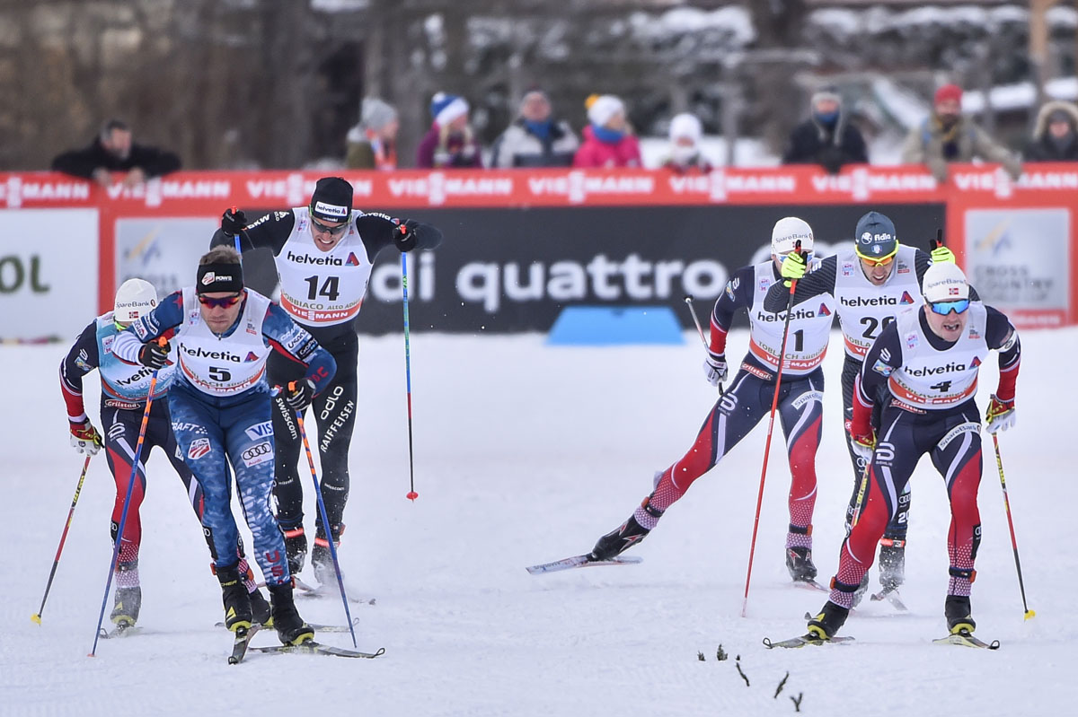 Simi Hamilton (l) racing for first with Norway's Sindre Bjørnestad Skar (r) as they lead the men's final down the finishing stretch of Saturday's 1.3 k freestyle sprint at the World Cup in Toblach, Italy. Skar won the photo finish with Hamilton by 0.03 seconds. (Photo: Fischer/Nordic Focus)