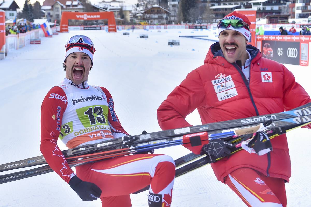 Canada's Alex Harvey (l) and Len Valjas celebrate their World Cup freestyle team sprint win on Sunday in Toblach, Italy. It was the first team-sprint victory for Canada since 2011 World Championships. (Photo: Salomon/NordicFocus)