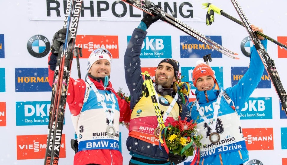 France’s Martin Fourcade (c) celebrates his 10th victory of the 2016/2017 IBU World Cup season in the men’s 12.5 k pursuit in Ruhpolding, Germany. Norway’s Emil Hegle Svendsen (l) placed second, and the Czech Republic’s Michal Krcmar (r) was third for the first podium of his career. (Photo: IBU)