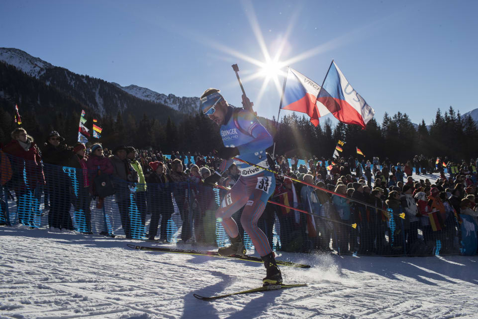 Russia's Anton Shipulin racing to his first IBU World Cup win of the season on Friday in the men's 20 k individual in Antholz, Italy. (Photo: IBU)