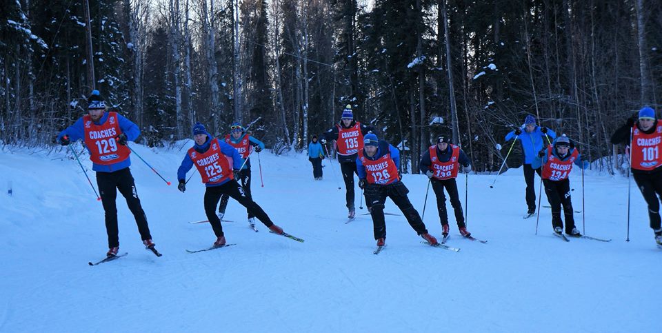 Coaches compete in the final ski-cross heat of the day, the coaches' race, on Feb. 4 in Fairbanks, Alaska. Racers include Galen Johnston (129), Eric Strabel (125), Anson Moxness (126), and Pete Leonard (101). (Courtesy photo)