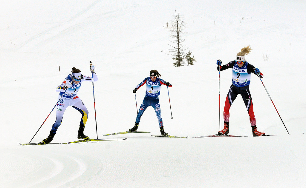 Norway's Marte Mæhlum Johansen (r) making a move up the final climb of the second-to-last lap in Friday's 10 k skiathlon at Junior World Championships at Soldier Hollow, while skiing with Sweden's Ebba Andersson (l) and USAs Katharine Ogden (c). (Photo: U.S. Ski Team/Tom Kelly)