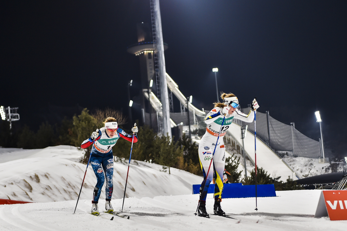 American Sophie Caldwell chasing Sweden's Maria Nordström in Friday's 1.4 k classic sprint at the PyeongChang World Cup in South Korea. Caldwell finished the day in eighth overall, behind Nordström in seventh. (Photo: Fischer/Nordic Focus)