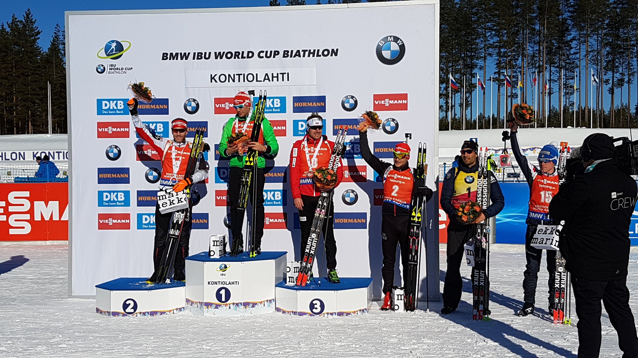 The IBU World Cup men's podium after the 12.5 k pursuit in Kontiolahti, Finland, where Arnd Peiffer of Germany outsprinted Simon Eder of Austria for the win. (Photo: IBU/Twitter)