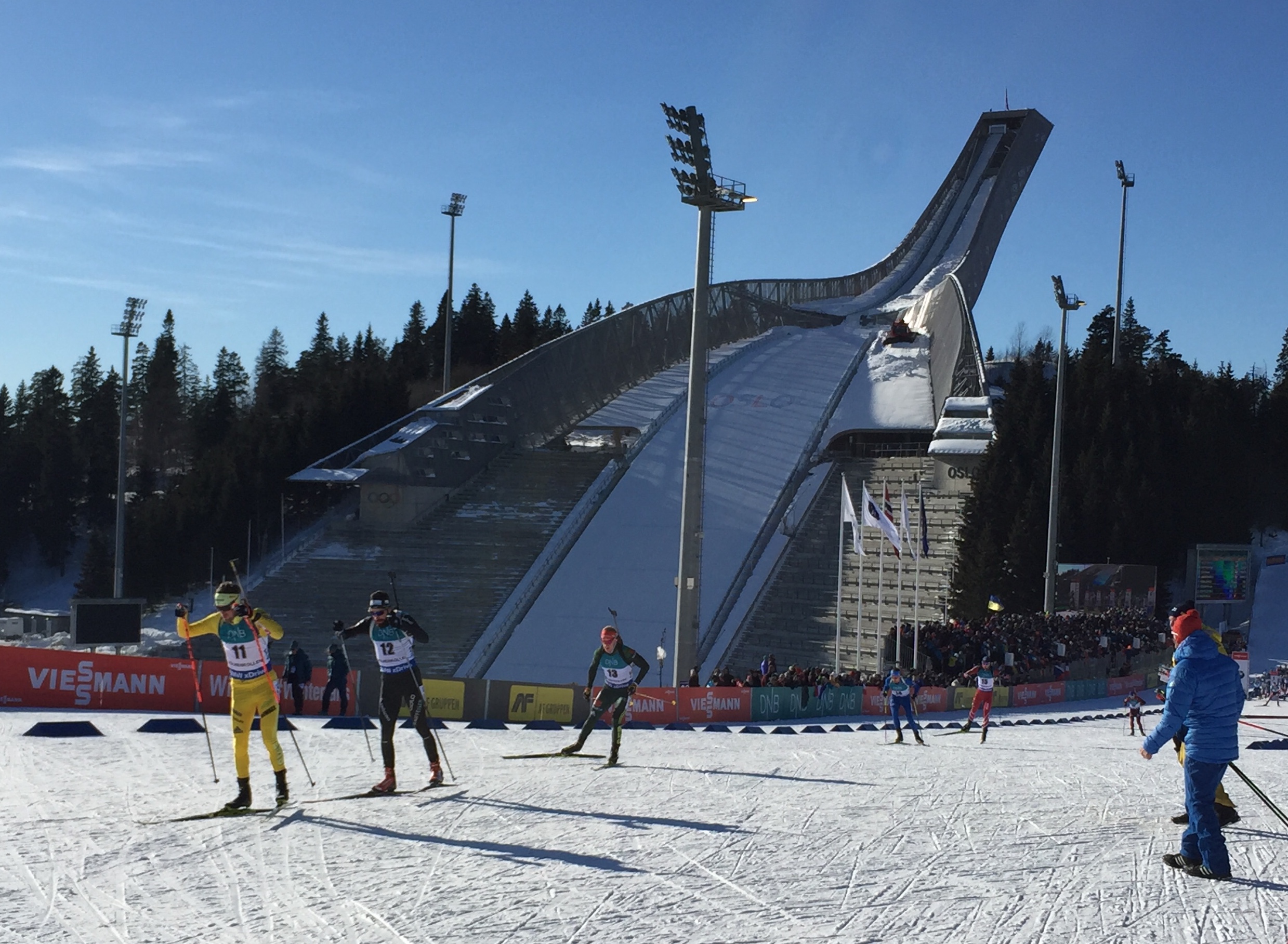 The men's field heads out of the start in the 12.5 k pursuit in Oslo, Norway. 