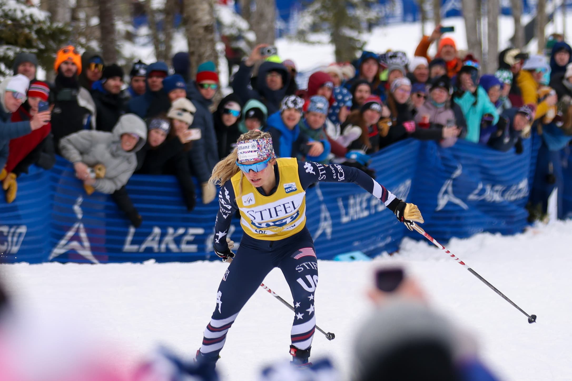 Jessie Diggins racing past a packed crowd at the Lake Placid World Cup Finals