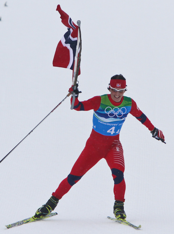 Bjoergen Leads Norway to Relay Gold