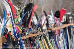 Skis get a rest while their owners warm up with coffee and hotdogs after the race