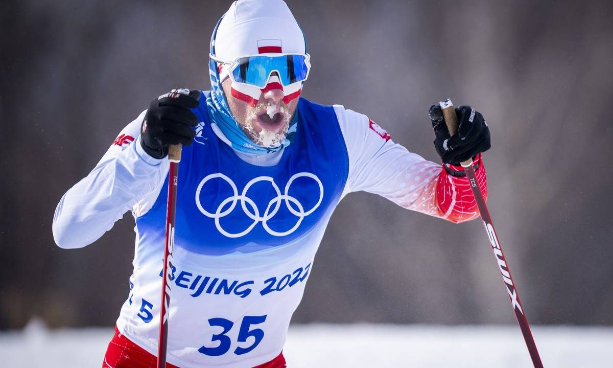 Organizers cut Saturday’s Olympic ski marathon in half. Now they’re facing a backlash.