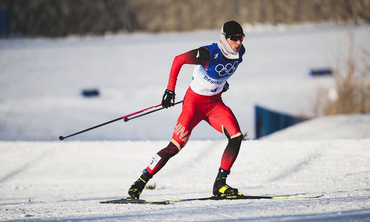 A Chinese athlete took cross-country skiing by storm last year. But as World Championships kick off, he’s stuck at home.
